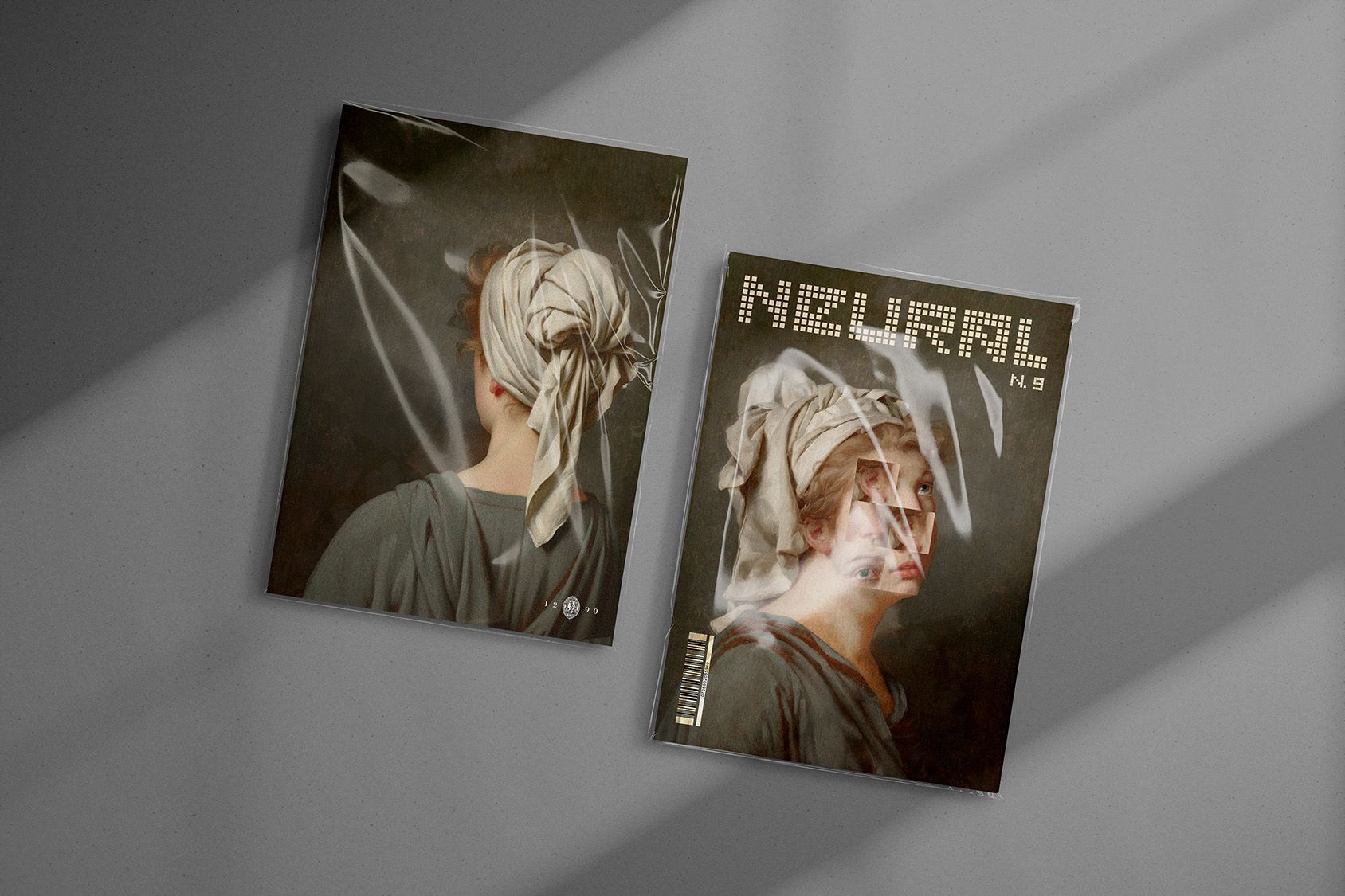 Two Neural Magazine covers under dramatic light